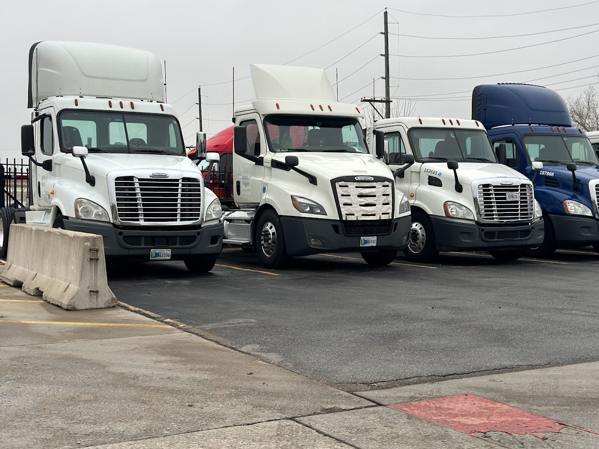 Fleet of tractors parked in a row