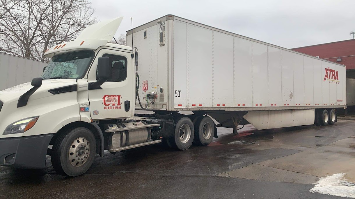 White tractor with 53-foot trailer